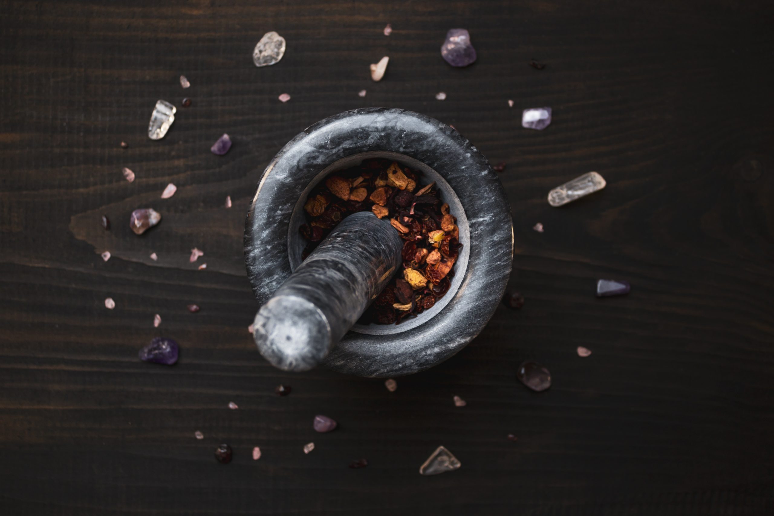 mortar-and-pestle-with-spices-multi-colored-stones-and-crystals-nabr-for-witchcraft